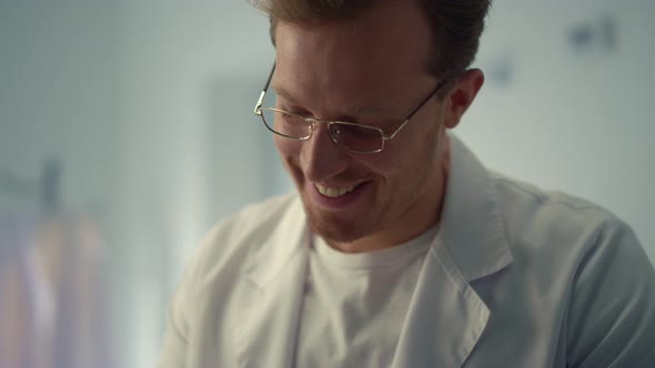 Portrait Smiling Doctor Consulting in Hospital Office alt