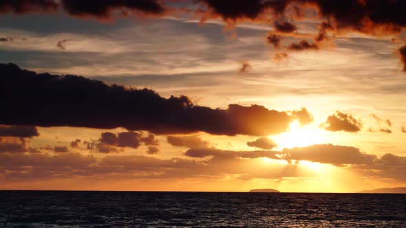 Sunset over Sea, Stormy Clouds. Time Lapse