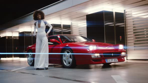 Glamourous Model In 70'S Fashion By Red Ferrari 348 TB alt