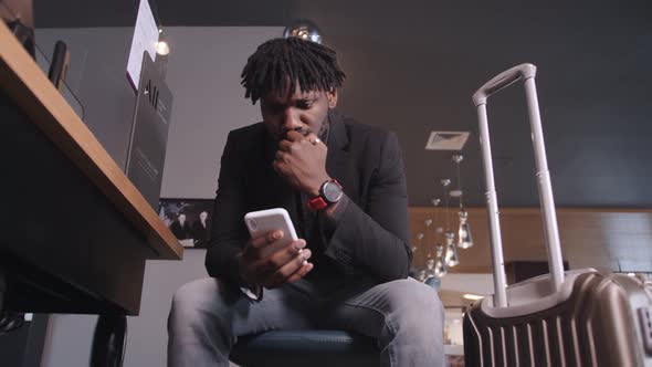 African American Businessman in Suit Talking on the Phone alt