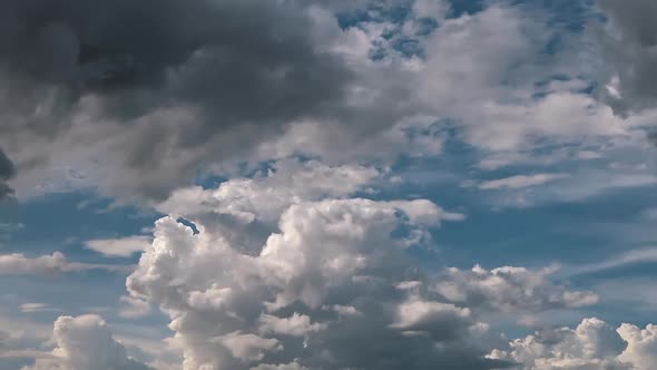 Billowing Big White and Gray Clouds Timelapse alt