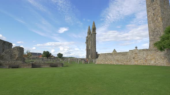 Green grass near stone ruins alt