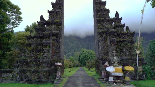 Gimbal shot going through Handara Gate in slow motion,Bali alt