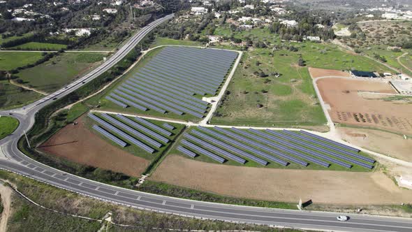 Topdown view solar panel production park near roads, Algarve. Portugal. Aerial orbit