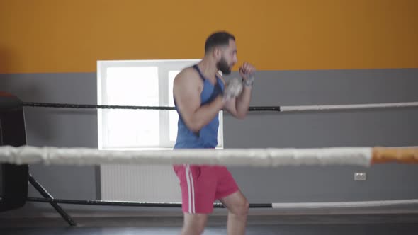 Workout of Middle Eastern Boxer Without Opponent alt