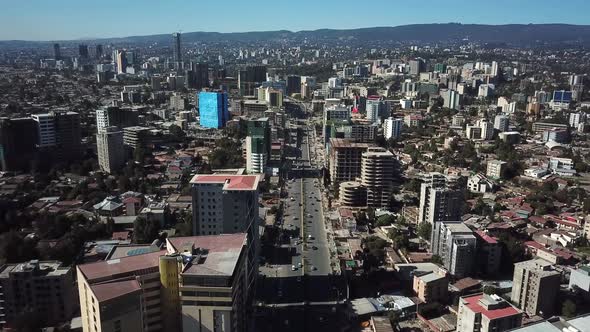 Addis Ababa, Ethiopia. Stunning aerial of dense populated area, highway traffic and high city buildi alt