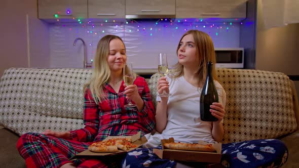 Beautiful Cheerful Girls in Pajamas Selebrates Holidays Alone at Home