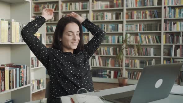 Young Happy Businesswoman Relaxing Resting in Office, Library alt