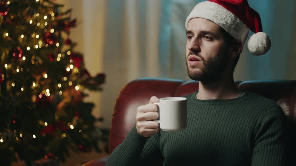 guy with cup in Christmas mood alt