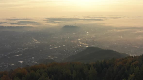 Aerial Cityscape of Graz in Austria at Misty Sunrise