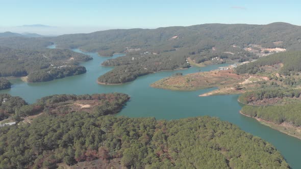 Unique aerial view of awesome Tuyen Lam Lake Da Lat plateau Vietnam forest hill highlands  alt
