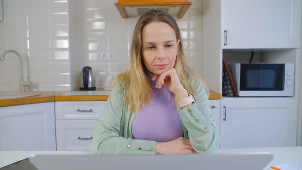 Entrepreneur businesswoman working on laptop computer at home during lockdown in 4k alt