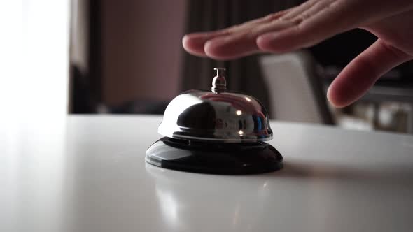 Hands of Man to Ring a Service Bell Continuously Rush and Urgency Case alt