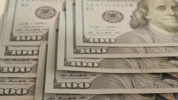 Rows of American dollar banknotes slow tilt 4K 2160p 30fps UltraHD footage - USA national currency i alt