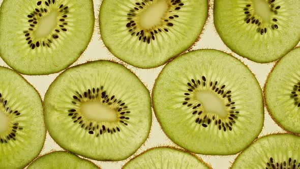Macro Shot of Sliced Kiwi Fruit Slices and Rotate alt