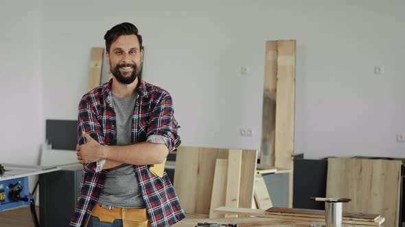 Video of portrait carpenter on the workplace. Shot with RED helium camera in 8K alt