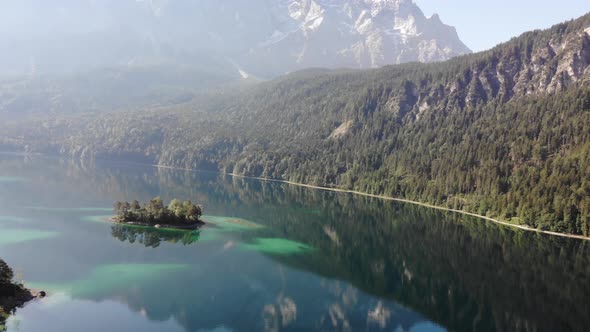 beautiful drone video of an lake and mountains, eibsee in bavaria alt