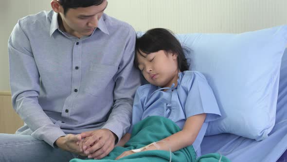 Father take care daughter sleeping alt