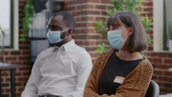 Close Up of Woman Attending Aa Therapy Meeting with People During Covid 19 Pandemic alt
