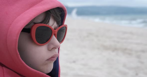 Depressed Child By the Sea alt