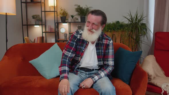 Senior Man Laughing Out Loud After Hearing Ridiculous Anecdote Funny Joke Feeling Carefree Amused alt