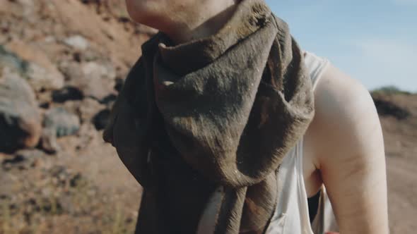 Woman Pulling Cart in Dystopian World alt