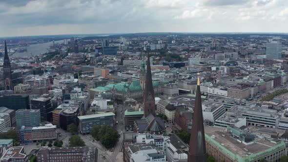 Aerial View of Historic City Centre with Tall Towers of City Hall and Churches alt