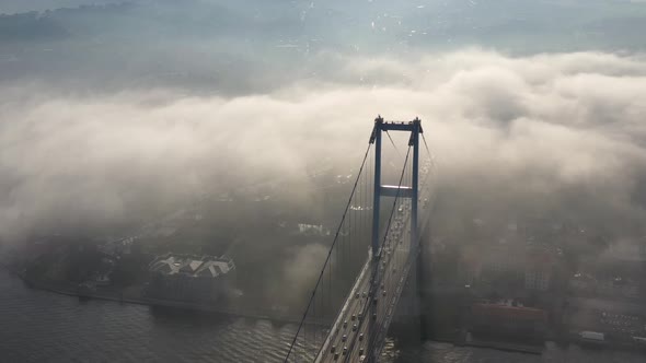 aerial video of bosphorus Bridge on a foggy day in Istanbul, Turkey, Martyrs Bridge alt