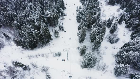 Aerial Vertical View at Chair Ski Lift