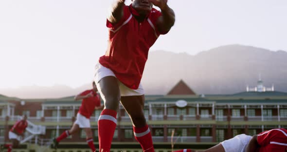 Male rugby player playing rugby in the stadium 4k
