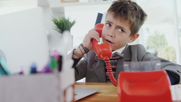 Boy making weird faces while taking on phone 4k alt