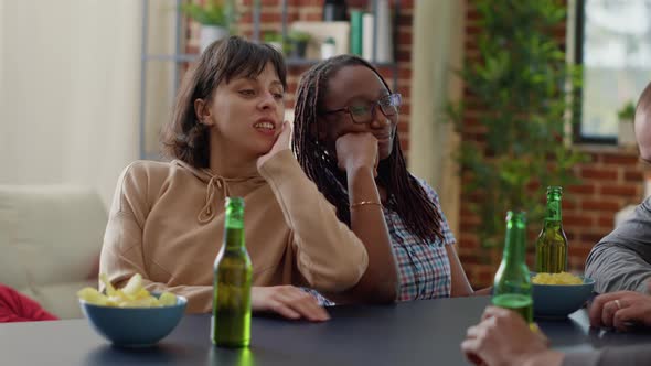 Happy People Having Funny Conversation at Gathering with Drinks alt