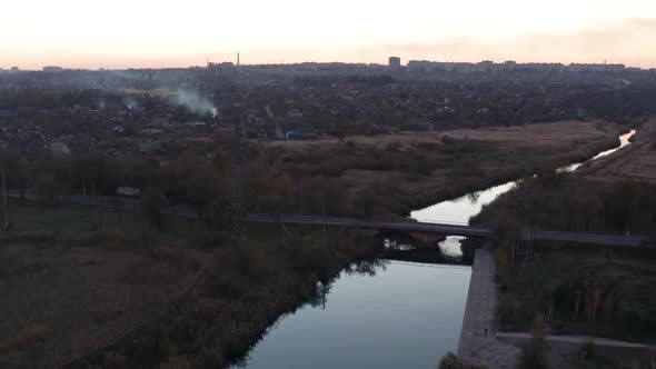 Bridge over a small river at dusk