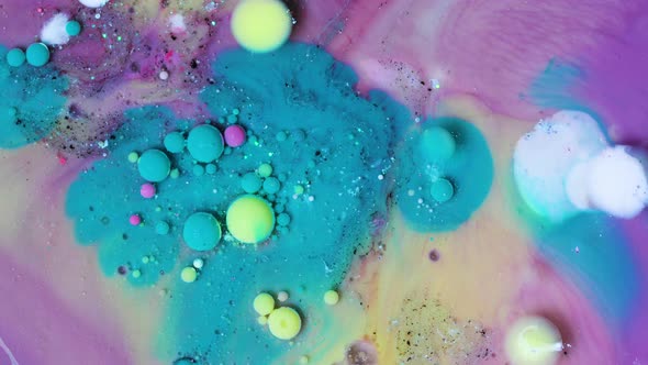 Abstract Acrylic Paint Spread Blast Explode Galaxy. Bright colored bubbles sparkling. alt