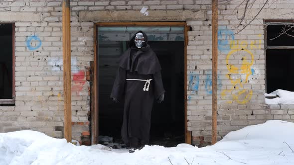 Grim Reaper in the Entrance of Derelict Building alt