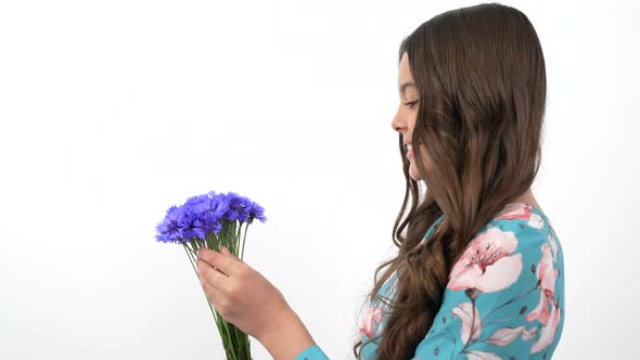 Smiling Kid Profile Look Taking Centaurea Wildflower Flower From Bouquet Flora alt