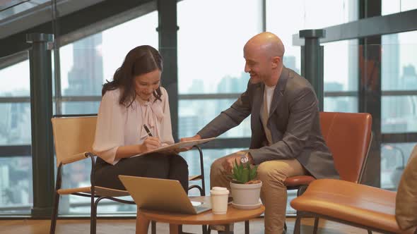 Salesman insurance agent employer wear suit handshake woman customer signing employment contract  alt