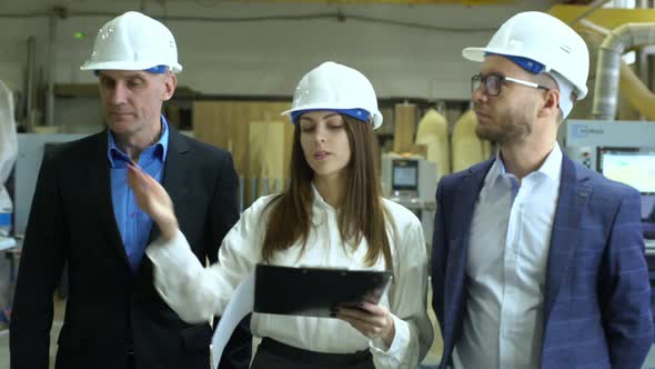 Footage of Executive Director Providing Excursion for Inspection or Sponsors on Furniture alt