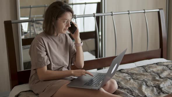 Woman Working Remotely Making a Phone Call