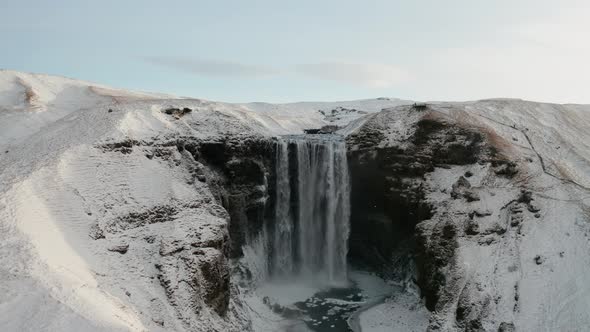 Aerial View of Skogafoss Waterfall During Sunrise, Iceland in Early Spring