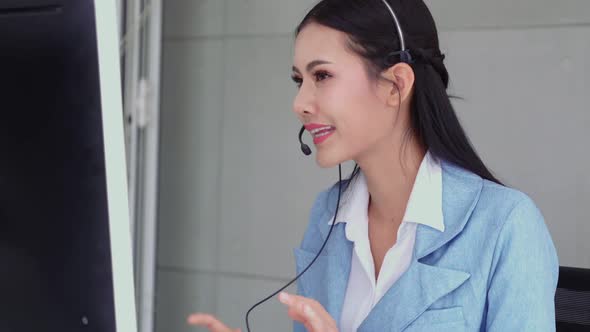 Customer Support Agent or Call Center with Headset Talking to Customer on Phone alt