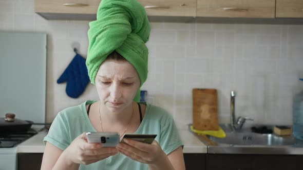 Woman Got Out of the Shower and Makes Purchases in the Online Store Using the Phone