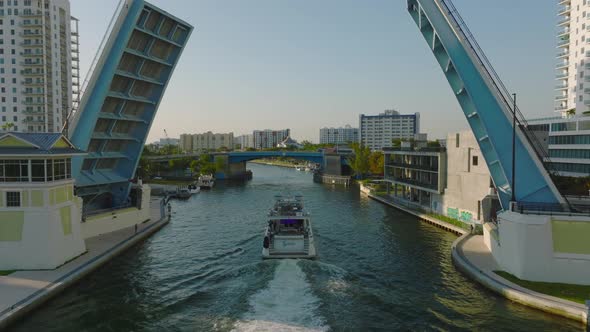 Forwards Tracking of Boat Driving on River Through Urban Borough alt