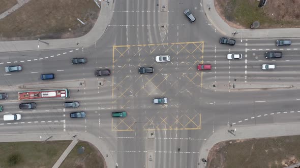 AERIAL: Cars Driving on a Street on a Rush Hour and Pedestrians Walking on Zebras alt