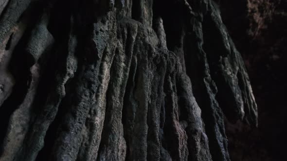 Underground Cave with Stalactite Rock Formations Hanging From Kuza Cave Ceiling alt