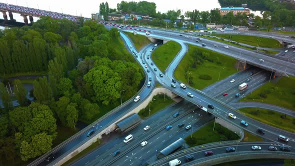 Aerial View of Loaded Cars with Traffic Jam at Rush Hour on Highway with Bridge