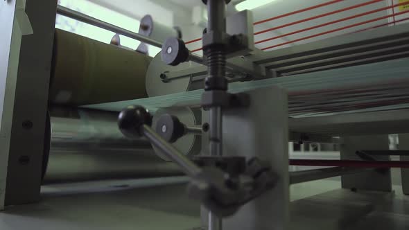 Roll of Fabric in a Production Machine, Close Up