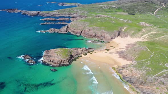 Aerial View of the Murder Hole Beach Officially Called Boyeeghether Bay in County Donegal Ireland alt