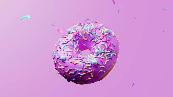 donut rotating close-up above a pink background with levitating sprinkles