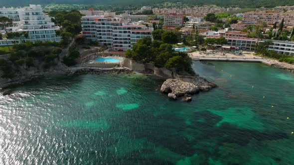 Aerial Drone Top Down Video of Small Emerald Sea Tropical Port alt